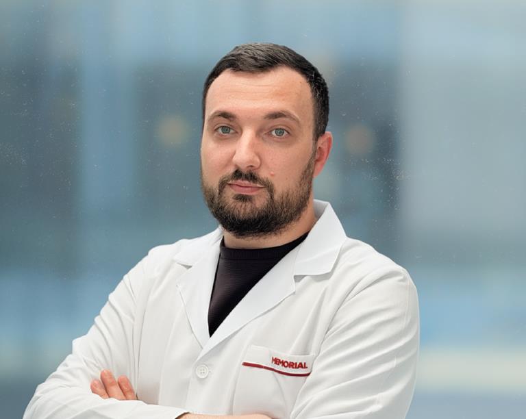 Dr. Dragoș Mihai Caravasile