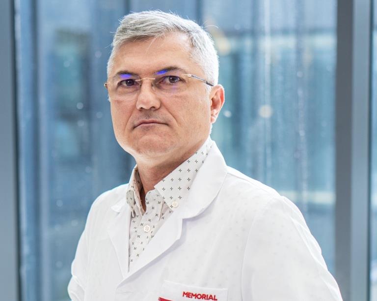 Dr. Mugur Grasu